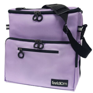 Buddy wheelchair walker tote attached to a manual wheelchair showing spacious compartments and adjustable straps